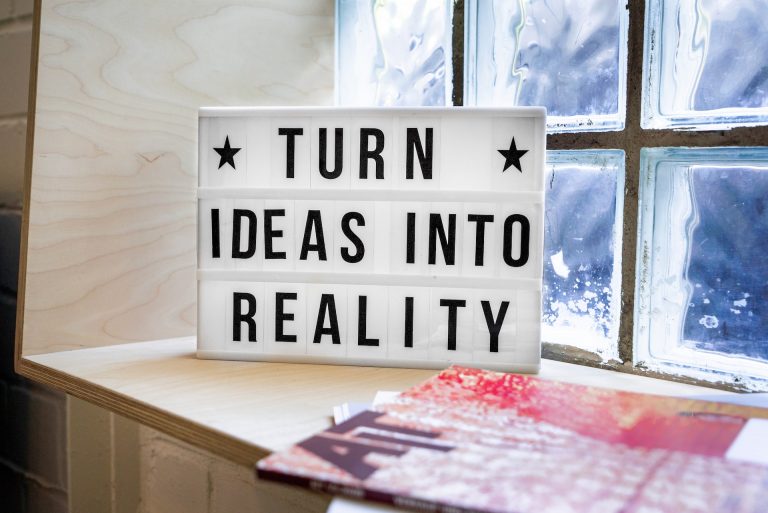 turn ideas into reality motivation sign